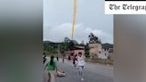 Watch: Bright orange rocket debris rains down on terrified villagers in China