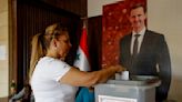 Syrians vote for new parliament that could pave the way to extend Assad's rule