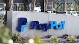 PayPal raises profit forecasts following series of job cuts