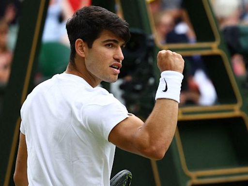 Carlos Alcaraz continues Wimbledon title defence with hard-fought semi-final win over Daniil Medvedev