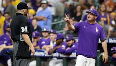 Umpires criticized for controversial fan interference call on Hayden Travinski home run in Game 1 vs. Texas A&M