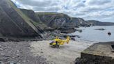 Woman airlifted to hospital after falling 15ft from coastal path