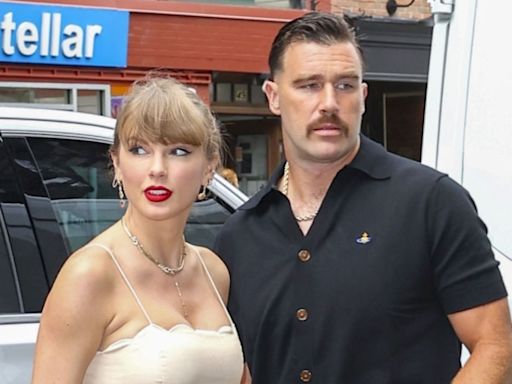 Taylor Swift attends New York wedding wearing cream floral dress with Travis Kelce