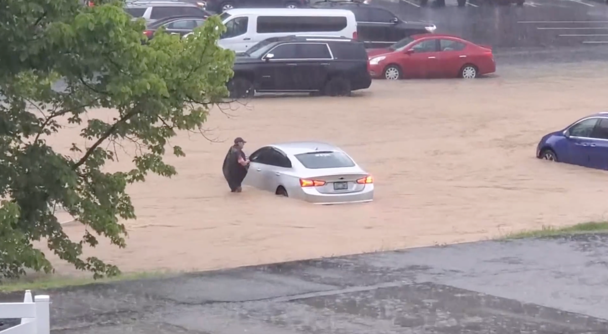 Dollywood flash flooding leaves visitors wading through waist-deep water to escape washed-out park