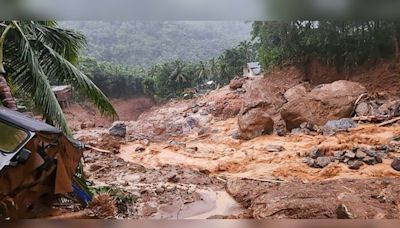 Man attempts to survive in landslide-hit Wayanad hamlet by clinging to boulder - CNBC TV18
