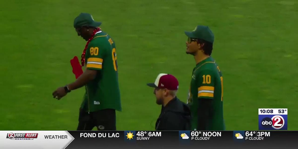 Donald Driver passes the Green Bay Charity Softball Game torch to Jordan Love after this year’s event