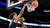 10th-ranked Marquette moves into first place in Big East basketball standings with road victory at Georgetown