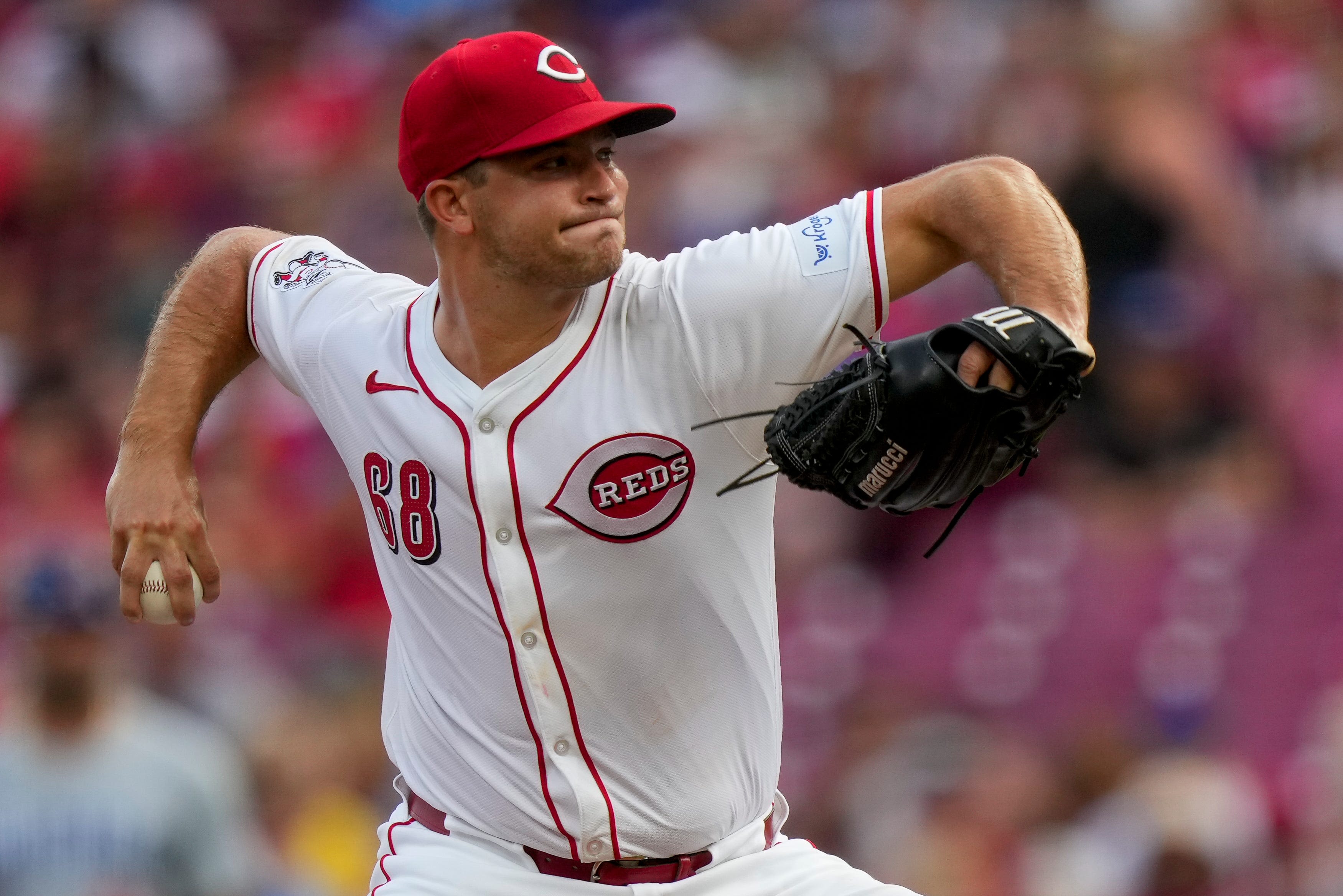 Spiers, Benson and Friedl lead the Reds to a series-opening win over the Cubs
