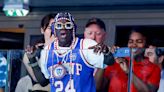 Flavor Flav Celebrates Beginning of August at the 2024 Olympics With Taylor Swift Lyric