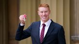 I’ve had worse Thursdays, jokes Olympic swimmer Tom Dean as he collects MBE