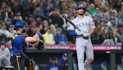 Sputtering offense, controversial call sink Texas Rangers in loss to first-place Mariners