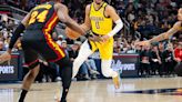 Pacers rout Hawks to lock up playoff berth