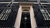 Who else lives in Downing Street apart from the prime minister?