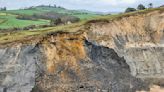 Horror moment hundreds of tons of rock falls from 200ft Dorset cliff