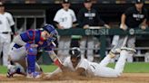 Chicago White Sox score 3 in the 8th — including overturned call at the plate — in 7-6 win over Texas Rangers