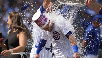 Hoerner's bases-loaded walk in the 10th gives the Cubs a 2-1 victory over the Diamondbacks