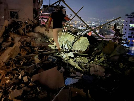 Israel carries out strike on Beirut suburb after Golan Heights attack kills 12 children