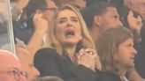 Adele yells 'SHUT UP!' to the rowdy England crowd just before penalty