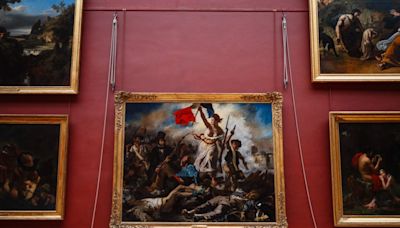 Two Activists Arrested After Sticking Posters Around “Liberty Leading The People” Painting at the Louvre