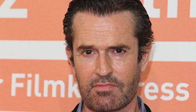 Rupert Everett admits he tries to avoid his reflection as he ages