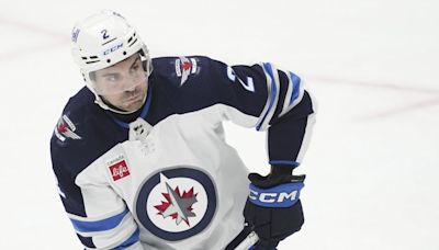 Winnipeg Jets sign defenceman Dylan DeMelo to four-year extension