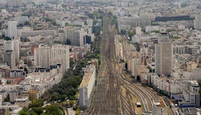 Paris Olympics off to rough start, with sabotaged trains and weather dampening mood before opening