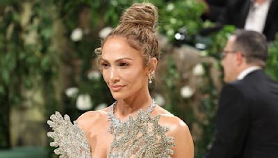 Jennifer Lopez Kept The Sheer Dress Trend Going By Sporting A Silver See-Through Ensemble At The Met Gala