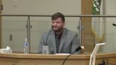 Former APD officer accused of dragging disabled man out of Target takes the stand
