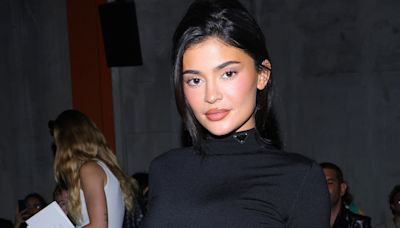 Kylie Jenner Accessorized Her Classic Black Triangle Bikini With a Y2k Belly Chain