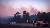 New Mexico governor declares emergency as thousands flee wildfires that have damaged 500 structures