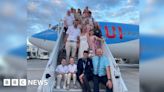 Newlyweds delight Bristol passengers by flying in bridal gear