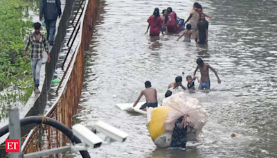 Mumbai building collapses kills 1, lake overflows as rains lash city - The Economic Times