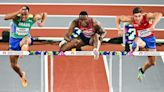 Grant Holloway extends 9-year win streak with world indoor hurdles title