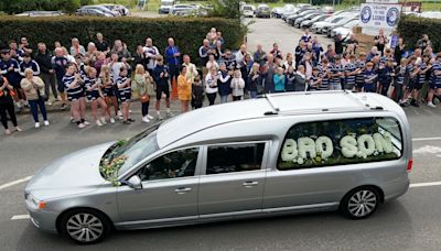 Crowds line streets to pay respects to rugby star Rob Burrow