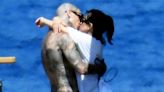 Kourtney Kardashian and Travis Barker Share a Kiss in Italy Ahead of Wedding Day