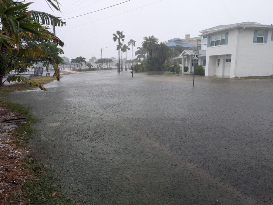 What streets are flooding in the Tampa Bay area due to Hurricane Debby