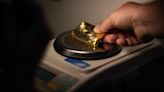 Gold jumps above $2,200 an ounce for first time on dovish Fed