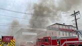 Firefighters battle fire at vacant building in Chelsea