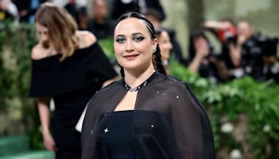 Lily Gladstone Embodies Easy Elegance in a transparent Black Cape Dress at the 2024 Met Gala