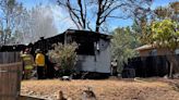 Crews respond to mobile home fire in Redding