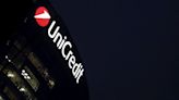 Exclusive-UniCredit cuts Amundi funds' share in assets under management - source