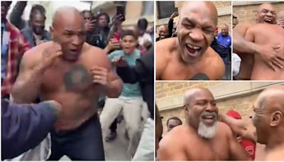 Mike Tyson brawls topless with Shannon Briggs on the street as he returns to his former home