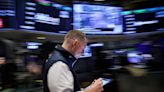 Wall St ends higher as investors firm bets on Trump win, rate cuts