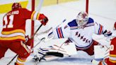 Erik Gustafsson's goal and assist lift the Rangers over the Flames 3-1