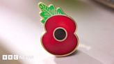 Pin containing Gold Beach sand designed by Shropshire veteran