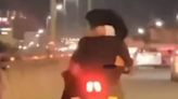 Man in Bengaluru booked for riding bike with a woman in his lap. VIDEO