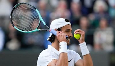 Lorenzo Musetti ousts Taylor Fritz after Novak Djokovic reaches Wimbledon semis with walkover