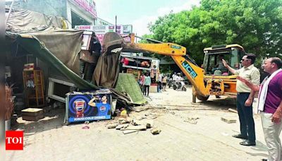 Illegal structures on MG Road razed in 2-day GMDA drive | Gurgaon News - Times of India