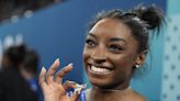 Simone Biles edges Brazil's Rebeca Andrade for her second Olympic all-around gymnastics title