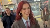 Dua Lipa Makes the Pantsless Trend Look Preppy in an Oversize Blazer and Blood-Red Tie